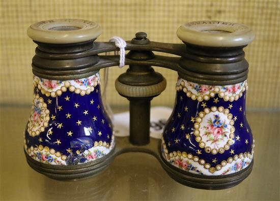 A pair of opera glasses and a cased knife
